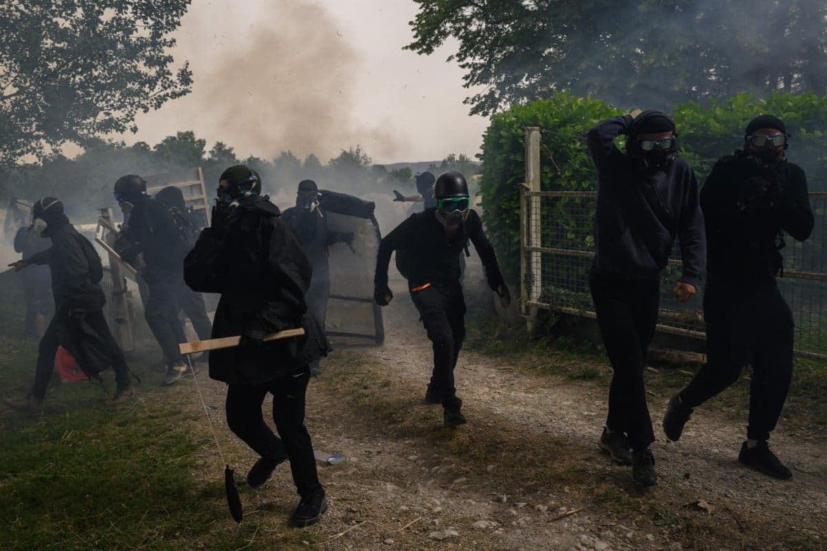 Five hurt as police and activists clash at French motorway protest