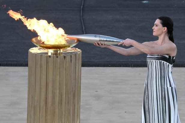 Greece hands Olympic flame to 2024 Paris Games hosts