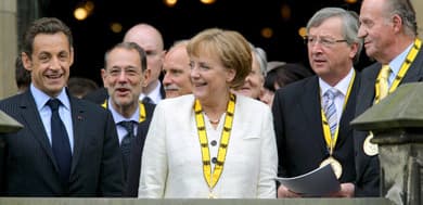 Merkel receives Charlemagne award for EU efforts