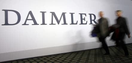 Daimler lowers profit forecast even as second quarter sales rise
