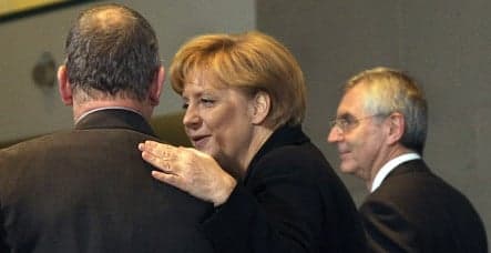 Opel executives go cap-in-hand to Merkel