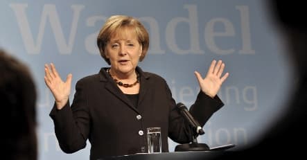 Merkel pledges aid to depressed west