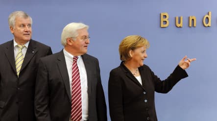 Merkel defends stimulus package