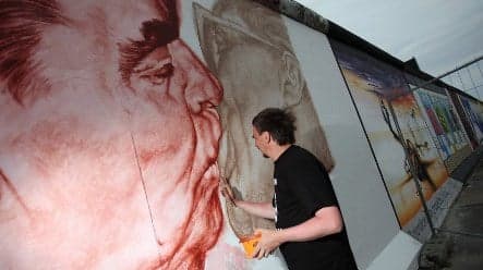 Berlin Wall art restoration in full swing ahead of anniversary