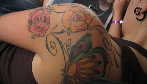 Women banned from nightclub for 'distasteful' tattoos