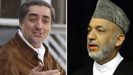 Merkel praises Karzai for agreeing to runoff