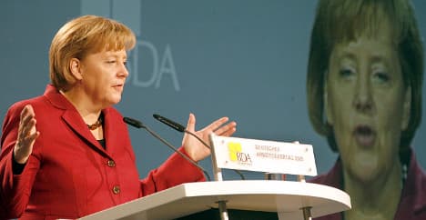 Merkel expects 'thank you' as GM repays loans