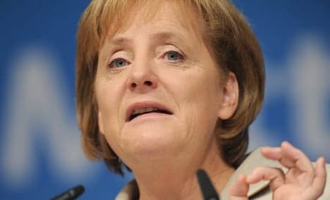 Merkel warns banks over tight lending habits