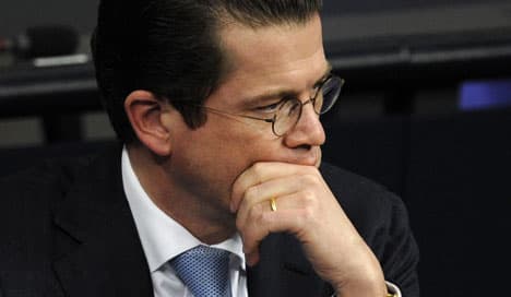 Pressure mounts on Guttenberg over air strike