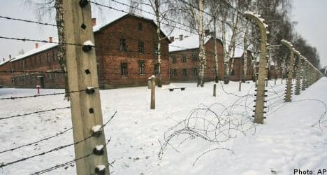 Swede charged over Auschwitz sign theft