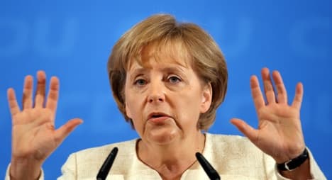 Merkel rejects weak leadership criticism