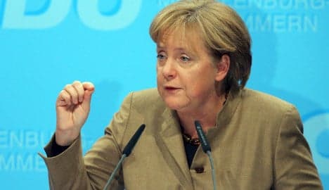 Merkel chides banks for role in Greek crisis