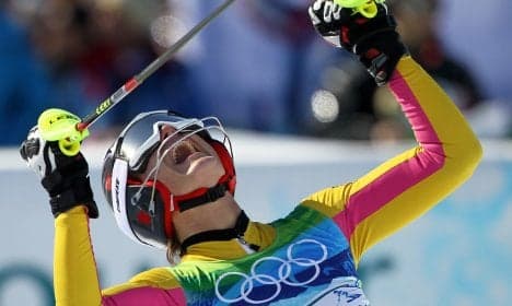 Riesch takes gold in super-combined