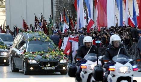 Merkel misses Kaczynski funeral but Westerwelle takes helicopter