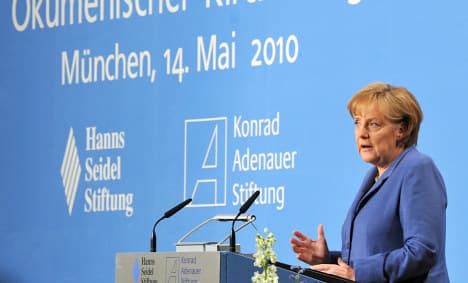 Merkel says major budget cuts on the horizon
