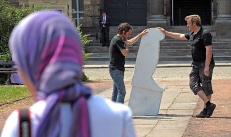 Vandals attack 'veil martyr' memorial
