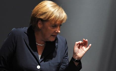 Merkel calls for global financial market tax