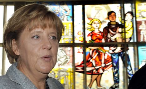 Merkel still hoards after East German upbringing, she says