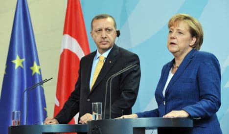 Merkel promises German help in Cyprus impasse