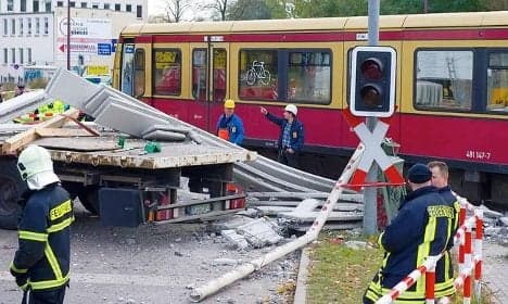 Berlin S-Bahn train crashes into truck