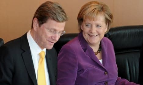 Westerwelle mends differences with Merkel
