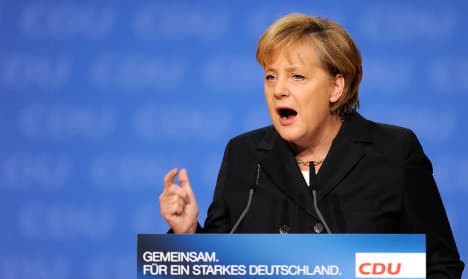 Feisty Merkel fires up conservatives