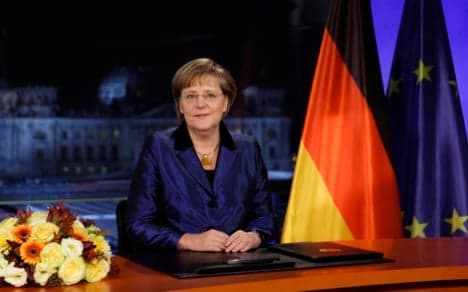 Merkel urges euro-faith in New Year's address