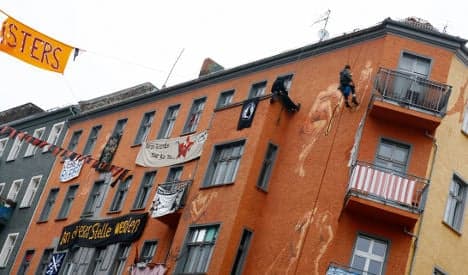 Residents of former squat square up for forced eviction