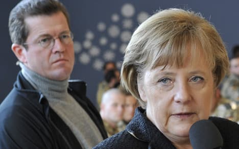 Merkel under fire in Guttenberg affair