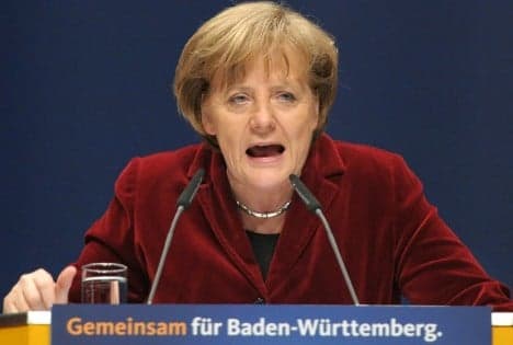 Merkel blames 'painful defeat' on Japan fears