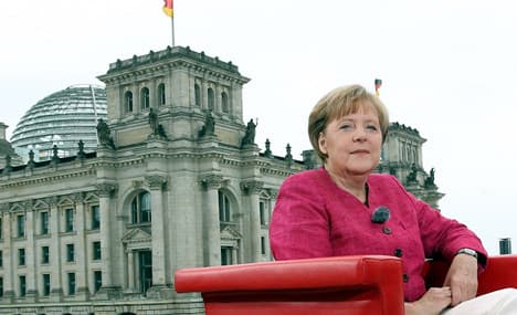 Merkel defends handling of eurozone crisis