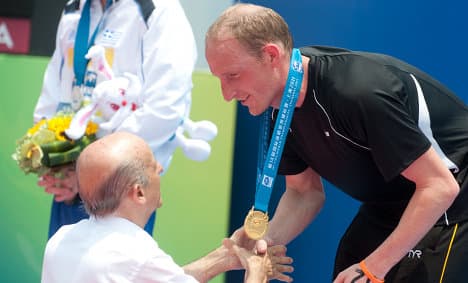 Open water swimmer Lurz takes fifth world title