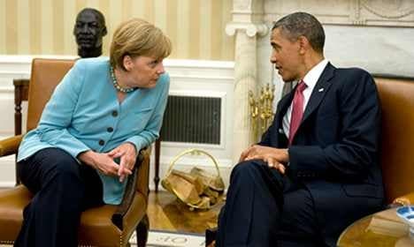 Obama, Merkel agree to boost global economy