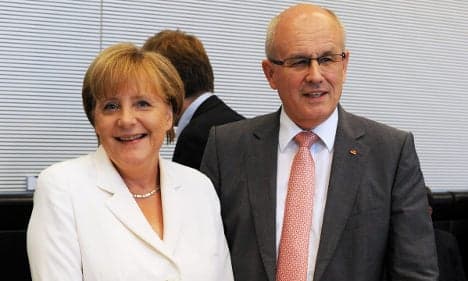 Merkel urges eurozone budgets court enforced