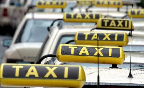 Taxi driver locks woman in boot after fare dispute