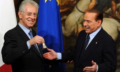 Merkel urges Monti to pass 'crucial' reforms