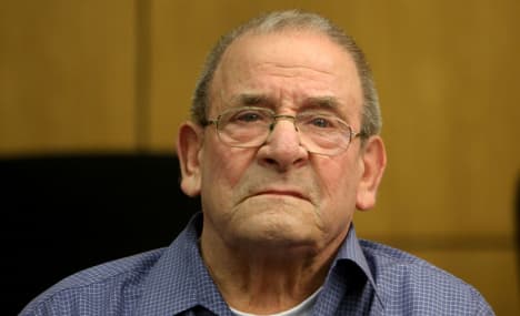 Elderly Nazi killer begins life prison term