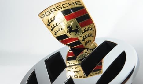 Investors sue Porsche over failed VW merger
