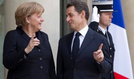 Sarkozy looks to Merkel for re-election help