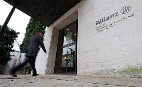 Allianz profits 'fell by half in 2011'