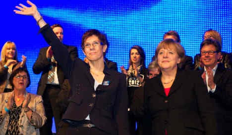 Voters deal Merkel surprise victory