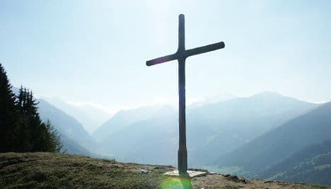 Angry Alpine tour guide chopped down crosses