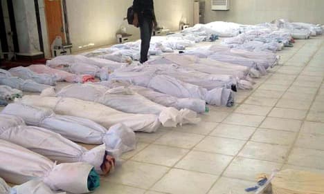 Germany expels Syrian envoy over massacre