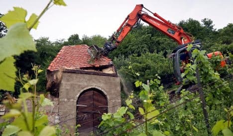 Beekeeper's illegal castle demolished