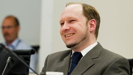Breivik posed 'to lighten the mood' after massacre
