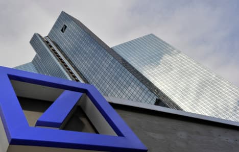 Deutsche Bank cuts 1,900 jobs as profits halved