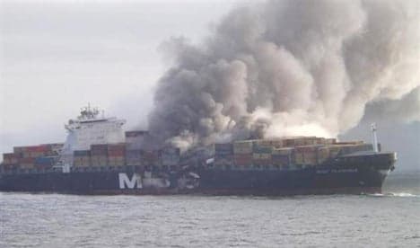 Burned cargo ship hunting for a port