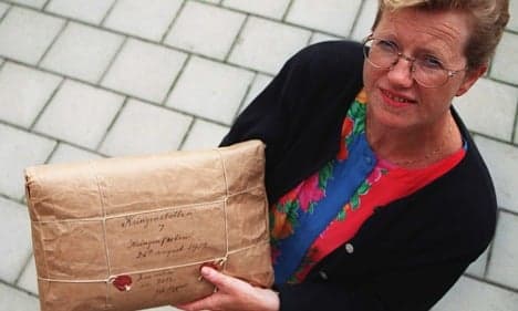 Town holds breath over 100-year-old package