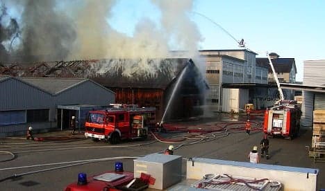 Mystery fire razes industrial buildings