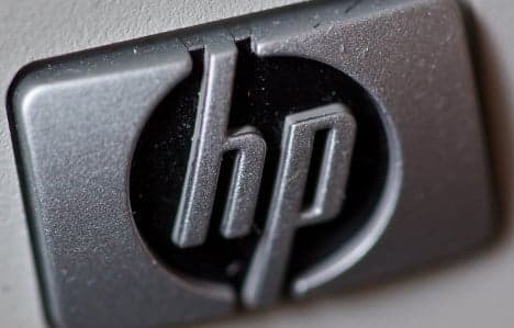 Hewlett Packard execs face bribery charges